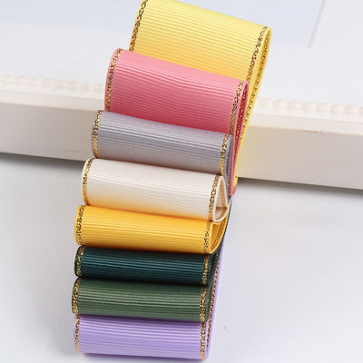 2.5 ซม โพลีเอสเตอร์ ทองขอบ ดับเบิ้ลหน้า ริบบอน Grosgrain สําหรับต้นคริสต์มาสและมือกระเป๋า