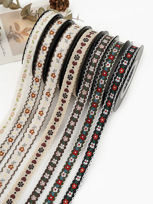 OEM ODM ดอกไม้ Jacquard Trim 10 มม-25 มม ดอกไม้ Jacquard ริบบิ้น